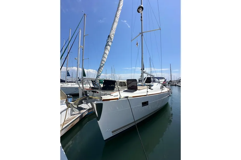 Slide: The Image of 2018 Elan 45 Impressions sailboat docked in a sunny marina. - 5