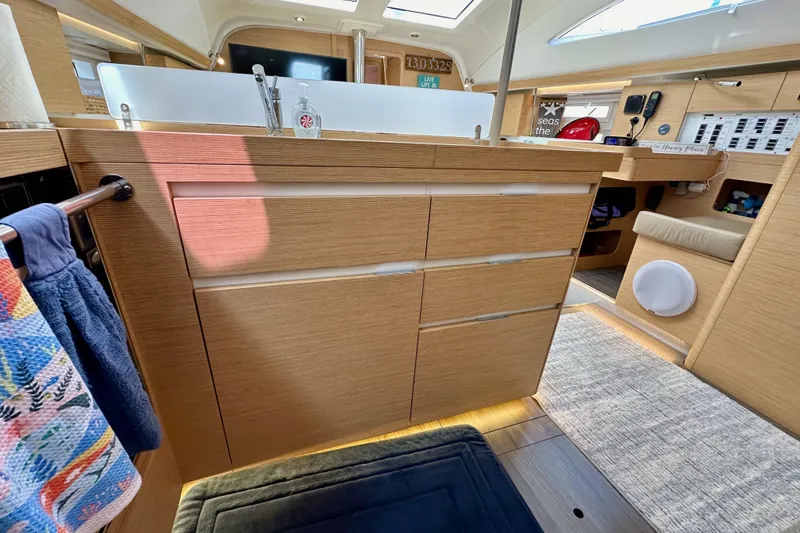 Slide: The Image of Modern kitchen interior of 2018 Elan 45 Impressions yacht with wooden cabinetry and sleek design. - 50
