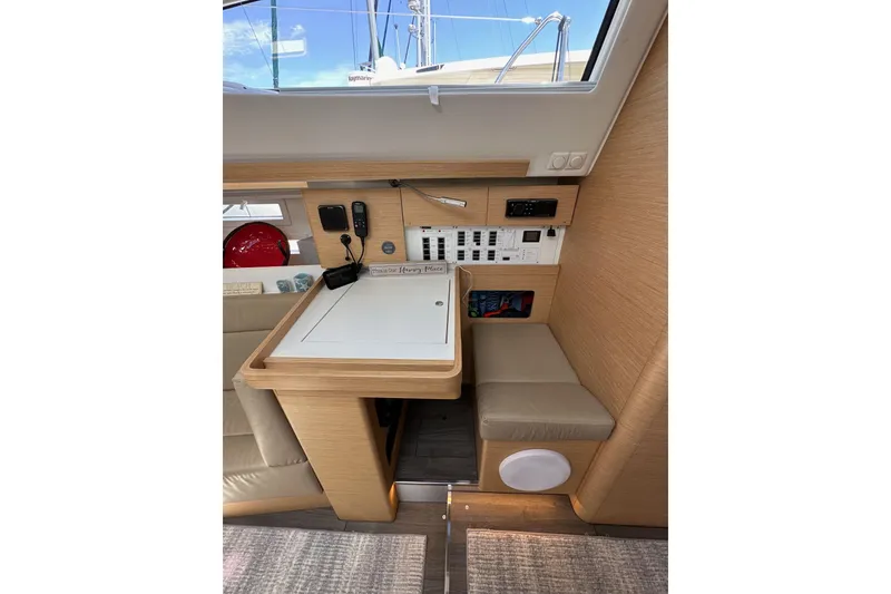 Slide: The Image of Interior of 2018 Elan 45 Impressions yacht with navigation station and control panel. - 59