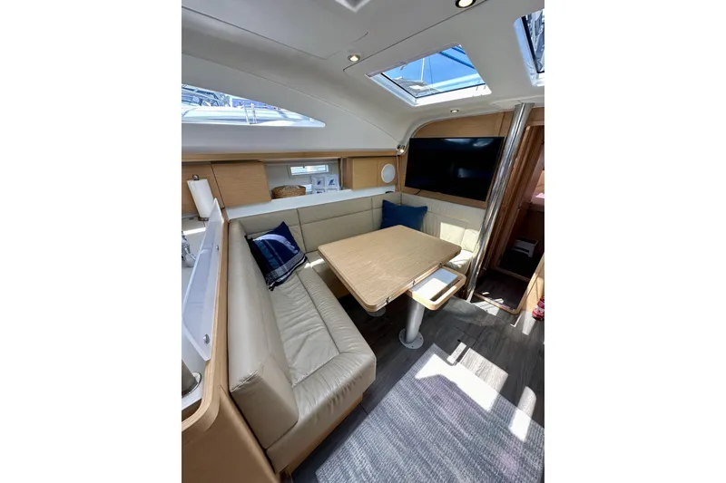 Slide: The Image of Interior of 2018 Elan 45 Impressions yacht with modern seating and skylight. - 62