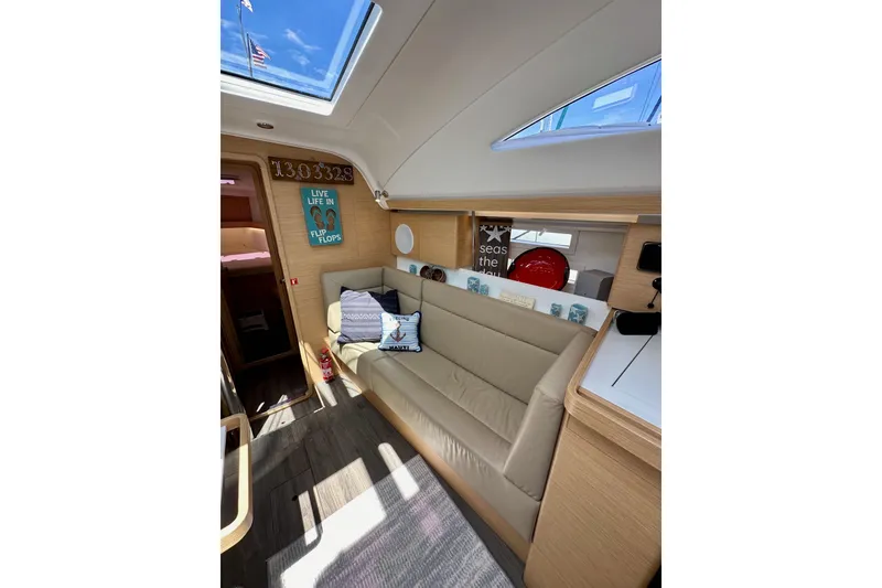 Slide: The Image of Interior of 2018 Elan 45 Impressions yacht with cozy seating and nautical decor. - 63