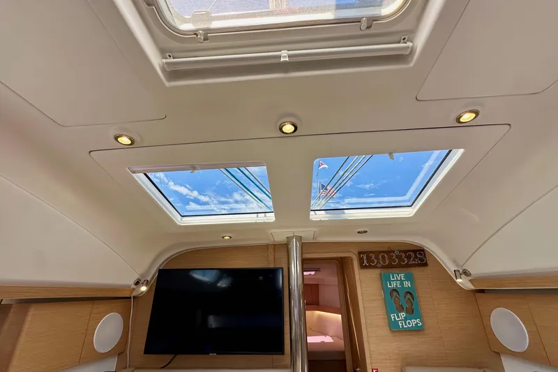 Slide: The Image of Interior of 2018 Elan 45 Impressions yacht with skylights and modern decor. - 64