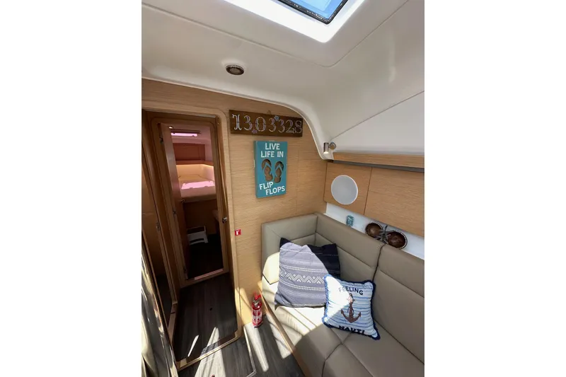 Slide: The Image of Interior of 2018 Elan 45 Impressions yacht with cozy seating and nautical decor. - 66