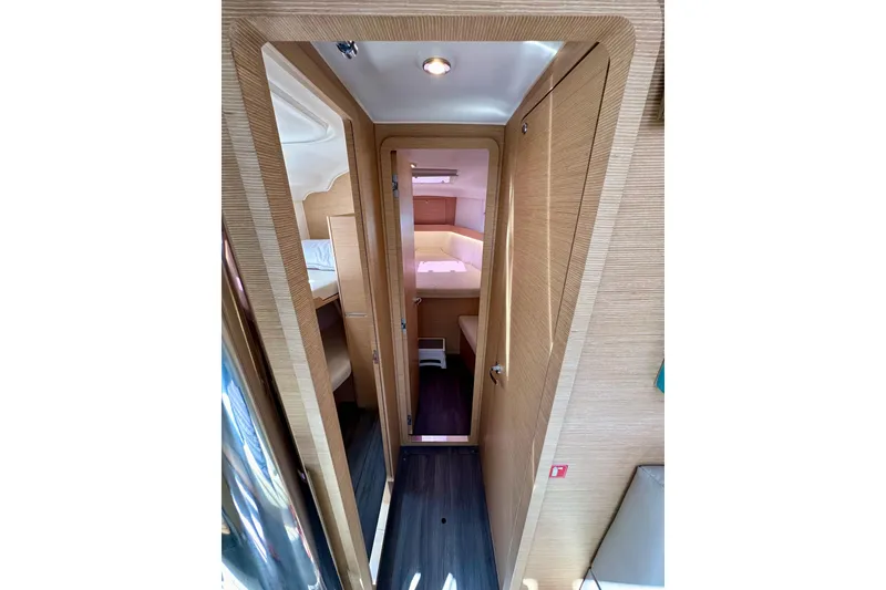 Slide: The Image of Interior view of 2018 Elan 45 Impressions yacht, featuring modern wood finish and cozy cabin. - 67