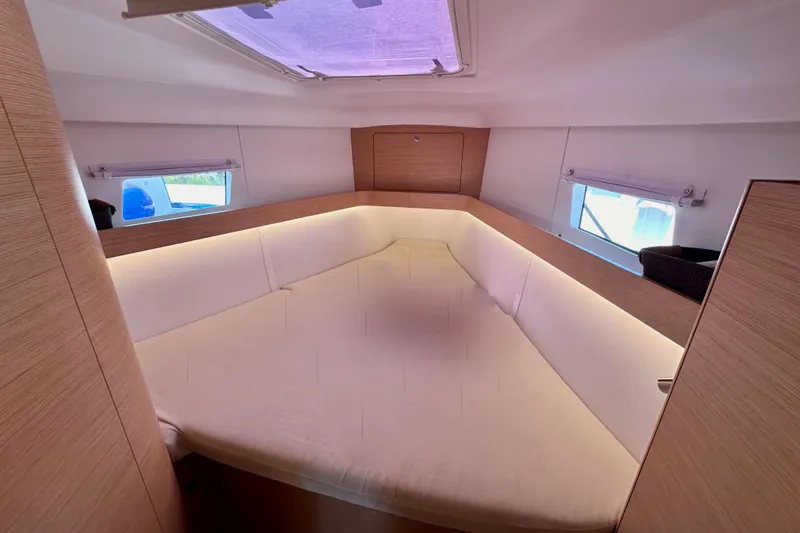 Slide: The Image of Interior cabin of 2018 Elan 45 Impressions yacht with cozy bed and natural lighting. - 72