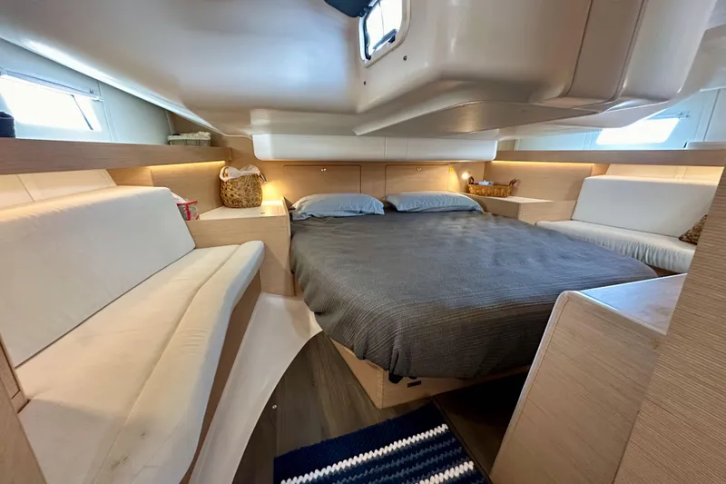 Slide: The Image of Luxurious cabin interior of 2018 Elan 45 Impressions yacht with cozy bed and seating. - 80