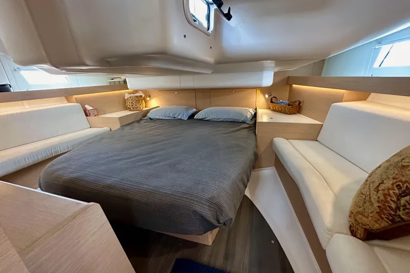 Slide: The Image of Luxurious cabin interior of 2018 Elan 45 Impressions yacht with cozy bed and seating. - 82