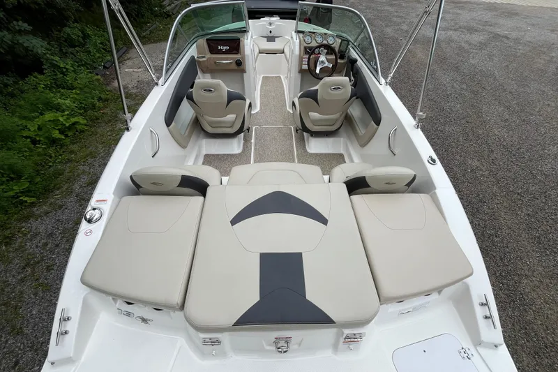 Slide: The Image of 2014 Chaparral 18 H2O Ski & Fish boat interior with seating and dashboard view. - 11
