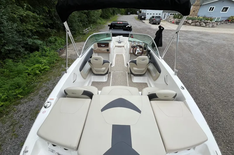 Slide: The Image of 2014 Chaparral 18 H2O Ski & Fish boat with spacious seating and sleek design. - 12