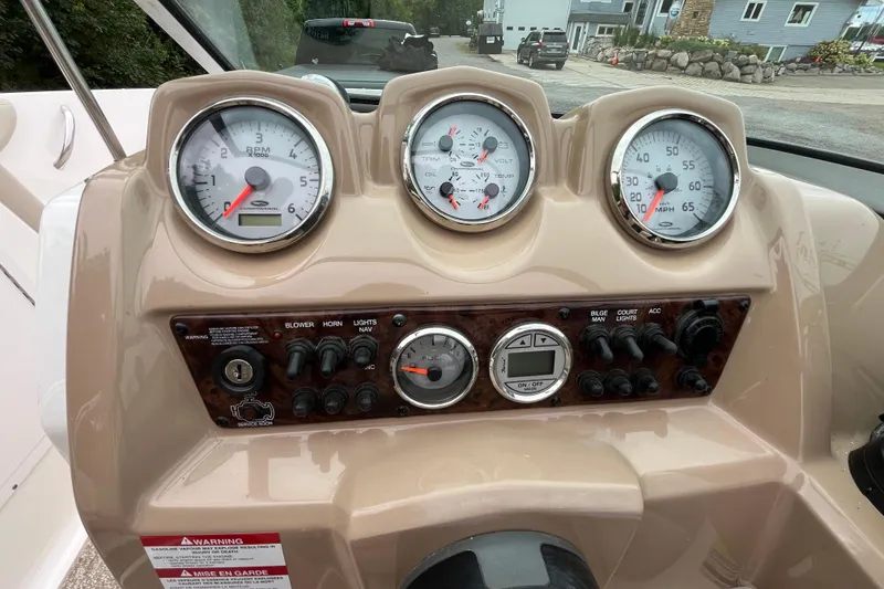Slide: The Image of Dashboard of a 2014 Chaparral 18 H2O Ski & Fish boat with gauges and controls. - 20