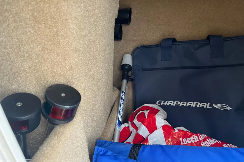 Slide: The Image of Storage compartment of 2014 Chaparral 18 H2O Ski & Fish boat with accessories. - 35