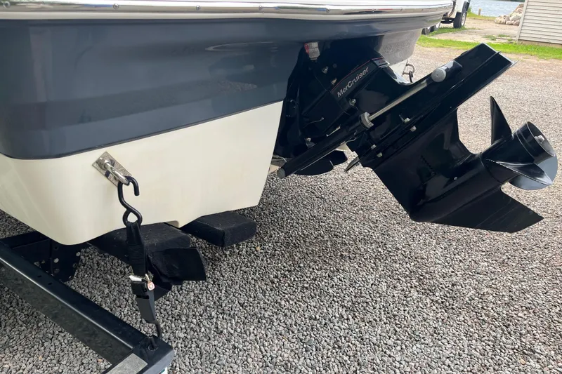 Slide: The Image of 2014 Chaparral 18 H2O Ski & Fish boat with MerCruiser engine on gravel. - 37