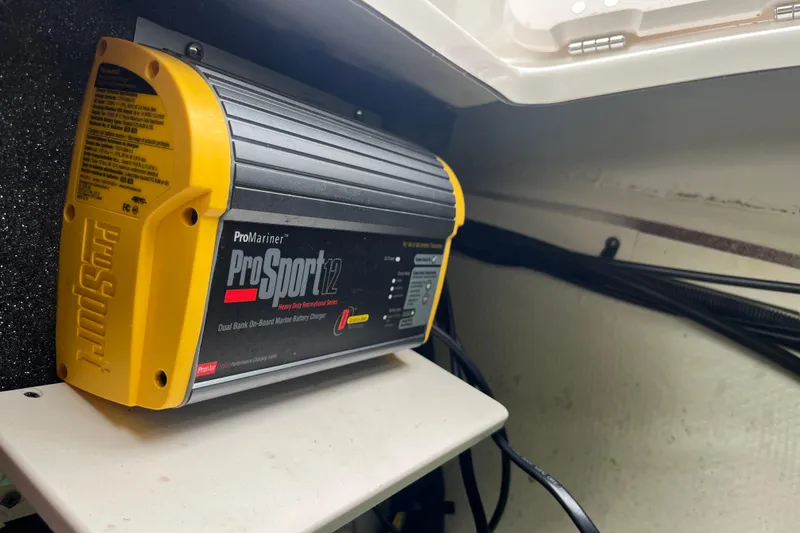 Slide: The Image of ProMariner ProSport 12 marine battery charger in 2014 Chaparral 18 H2O Ski & Fish boat. - 6