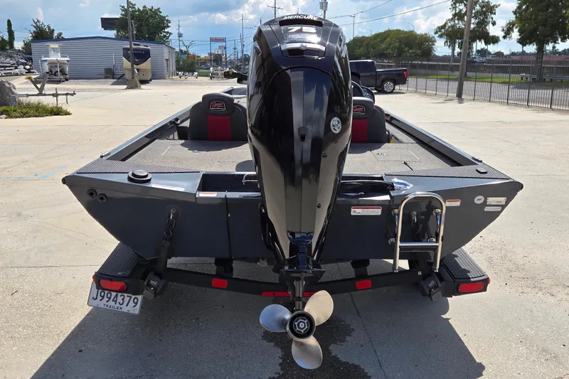 Slide: The Image of 2022 Ranger RT178 boat with Mercury 75 engine on trailer, outdoor setting. - 4