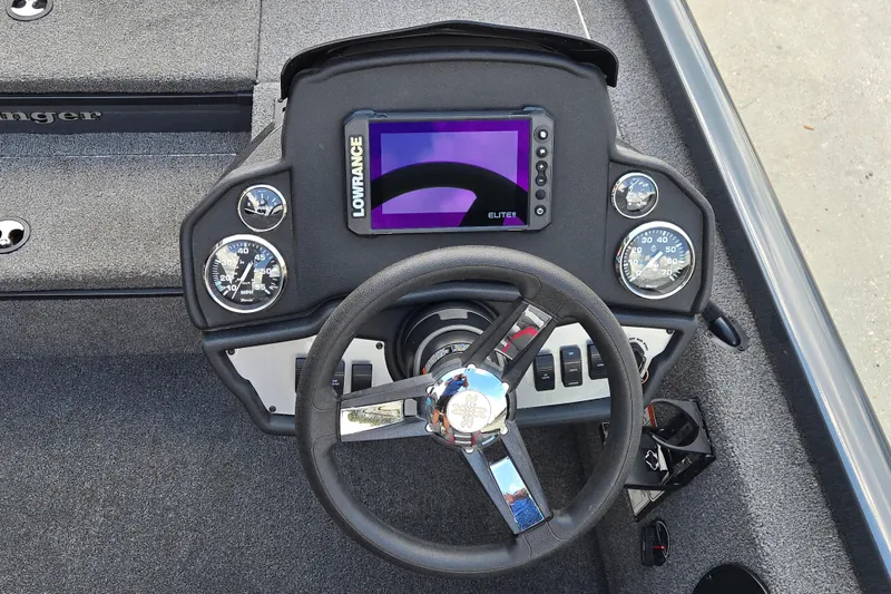 Slide: The Image of 2022 Ranger RT178 boat dashboard with steering wheel and Lowrance display. - 9