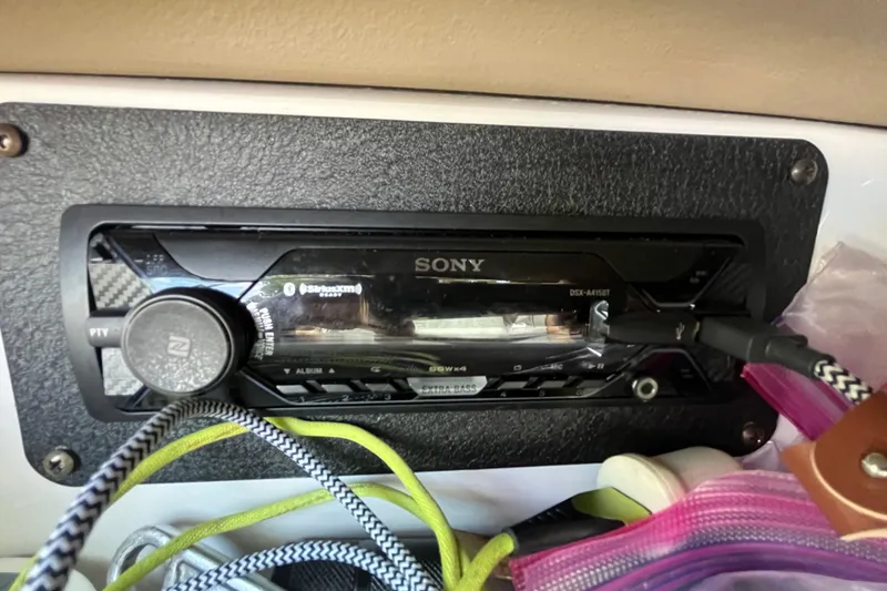 Slide: The Image of Sony stereo system in a 2008 Four Winns H180 boat dashboard. - 12