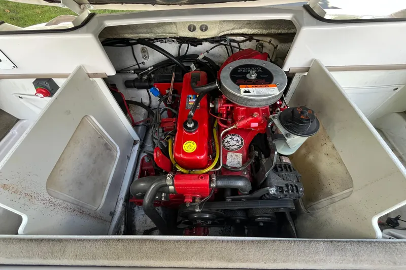 Slide: The Image of 2008 Four Winns H180 boat engine compartment with Volvo Penta engine, detailed view. - 18