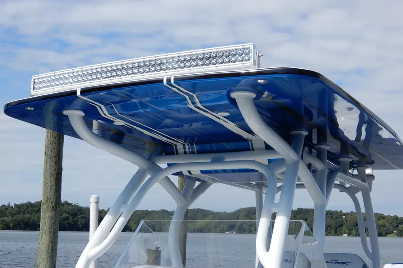 Slide: The Image of 2021 Concept 32' Open Deck boat with sleek blue canopy and LED light bar. - 13