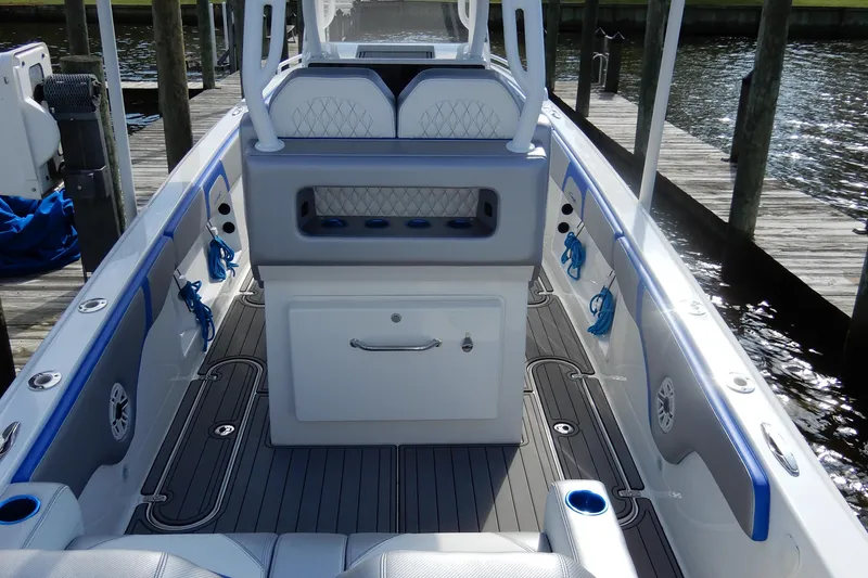 Slide: The Image of 2021 Concept 32' Open Deck boat interior with modern seating and storage. - 15