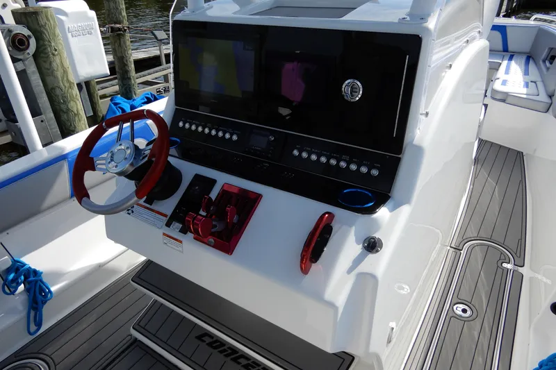 Slide: The Image of 2021 Concept 32' Open Deck boat with modern helm and red steering wheel. - 21