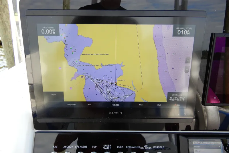Slide: The Image of Garmin GPS display on 2021 Concept 32' Open Deck boat, showing nautical map and coordinates. - 23