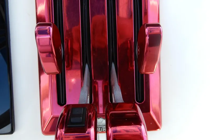Slide: The Image of Red throttle controls on a 2021 Concept 32' Open Deck boat. - 25