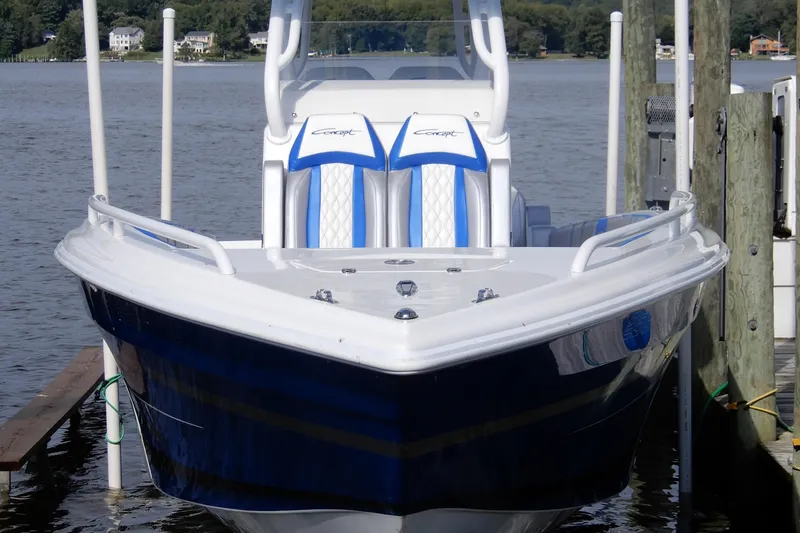 Slide: The Image of 2021 Concept 32' Open Deck boat docked on a calm lake. - 3