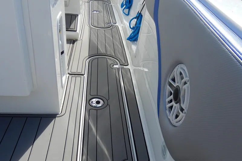 Slide: The Image of 2021 Concept 32' Open Deck boat with sleek gray flooring and speaker detail. - 31