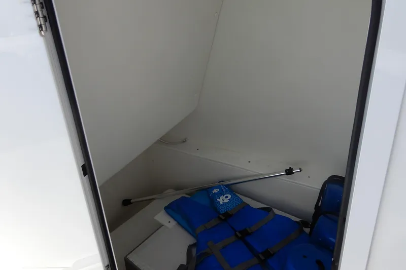 Slide: The Image of Storage compartment of 2021 Concept 32' Open Deck with life jackets and equipment. - 33
