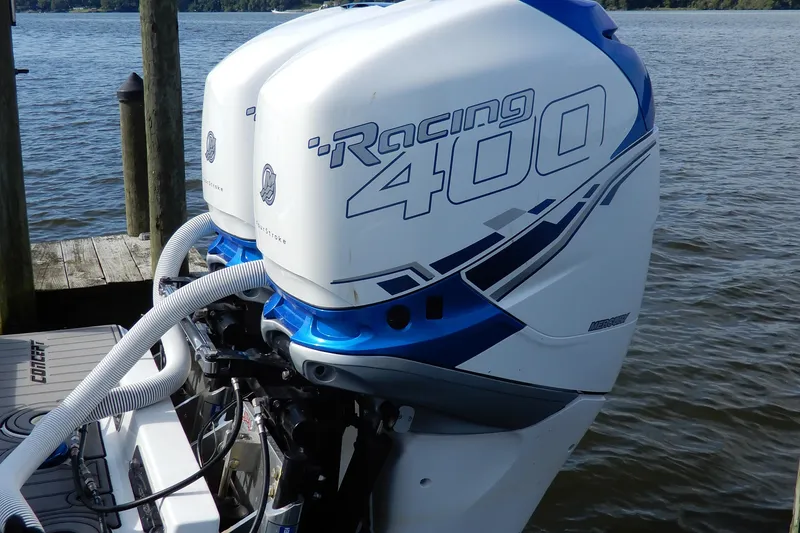 Slide: The Image of 2021 Concept 32' Open Deck with twin Racing 400 outboard engines on a lake. - 36