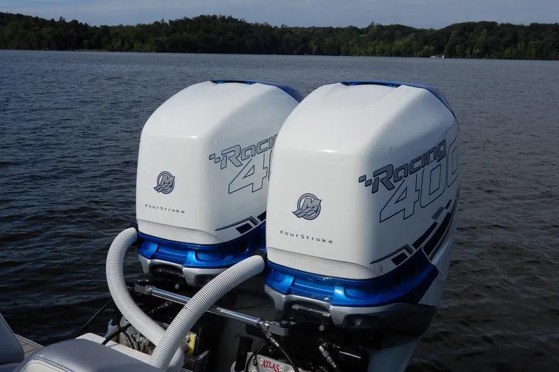 Slide: The Image of Twin Racing 400 outboard engines on a 2021 Concept 32' Open Deck boat. - 38