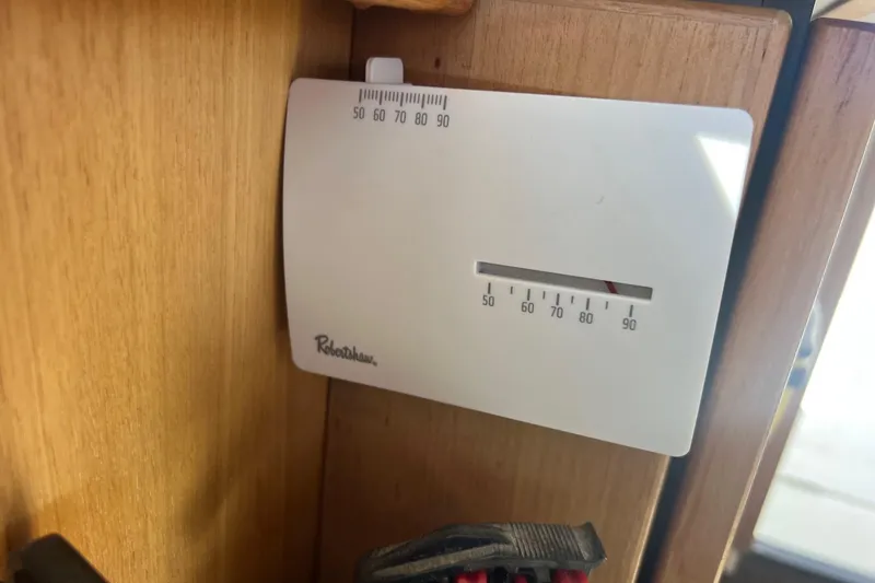 Slide: The Image of Thermostat on 2000 Bayliner 3388 Command Bridge Motoryacht, mounted on wooden panel. - 9