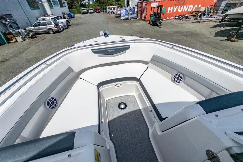 Slide: The Image of 2021 Robalo R247 Dual Console boat interior with spacious seating and modern design. - 14