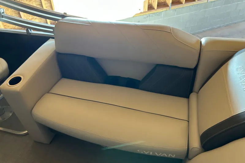 Slide: The Image of Luxurious seating on 2022 Sylvan Mirage Fish 820 Party Fish boat, featuring cup holder. - 2