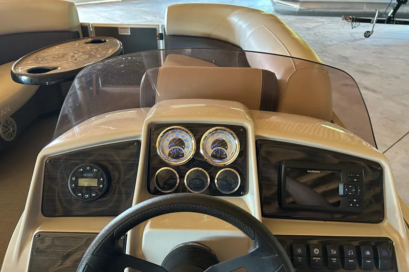 Slide: The Image of 2022 Sylvan Mirage Fish 820 Party Fish dashboard with gauges and Garmin display. - 8