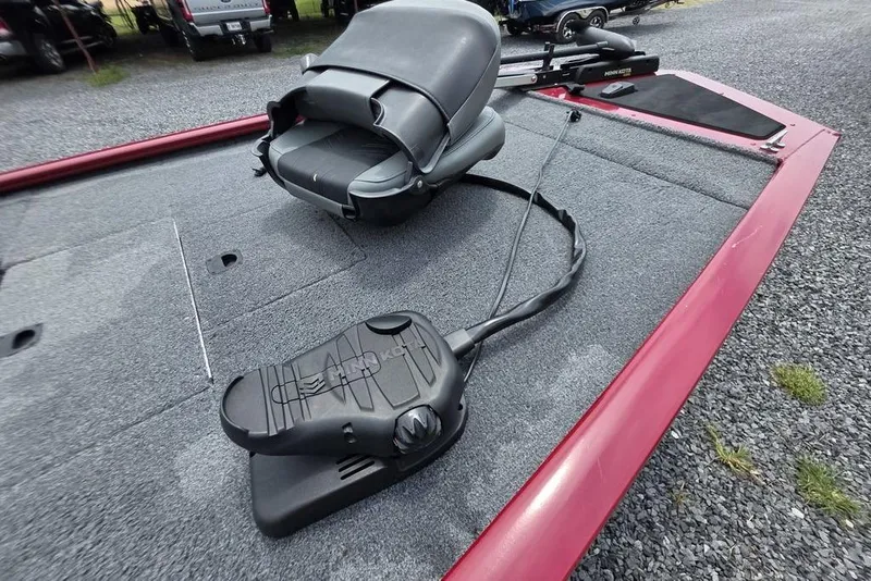 Slide: The Image of 2020 Tracker Pro 170 boat deck with seat and trolling motor pedal. - 7