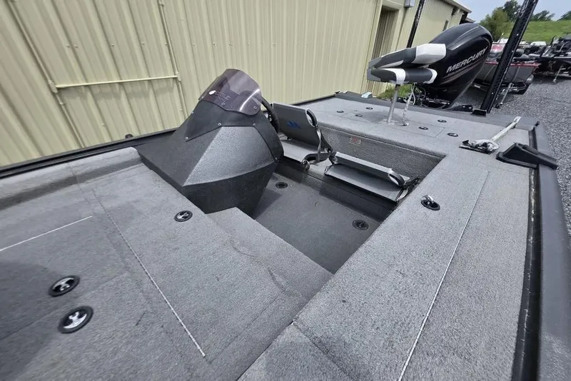 Slide: The Image of 2018 War Eagle 961 Predator boat interior with seating and Mercury engine. - 10