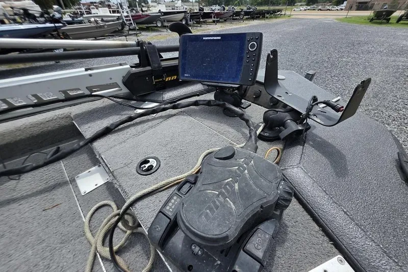 Slide: The Image of 2018 War Eagle 961 Predator boat with navigation equipment and control panel. - 11