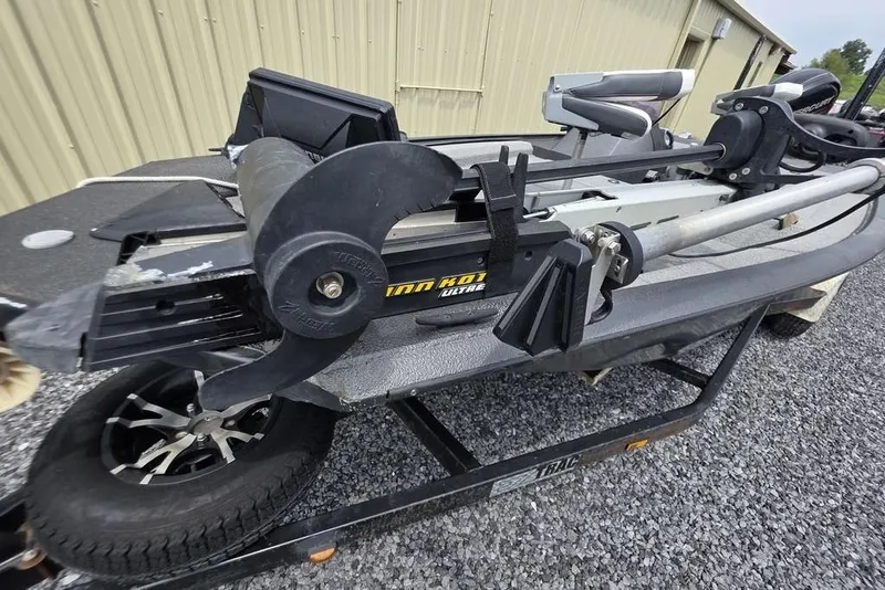 Slide: The Image of 2018 War Eagle 961 Predator boat with Minn Kota trolling motor on trailer. - 12