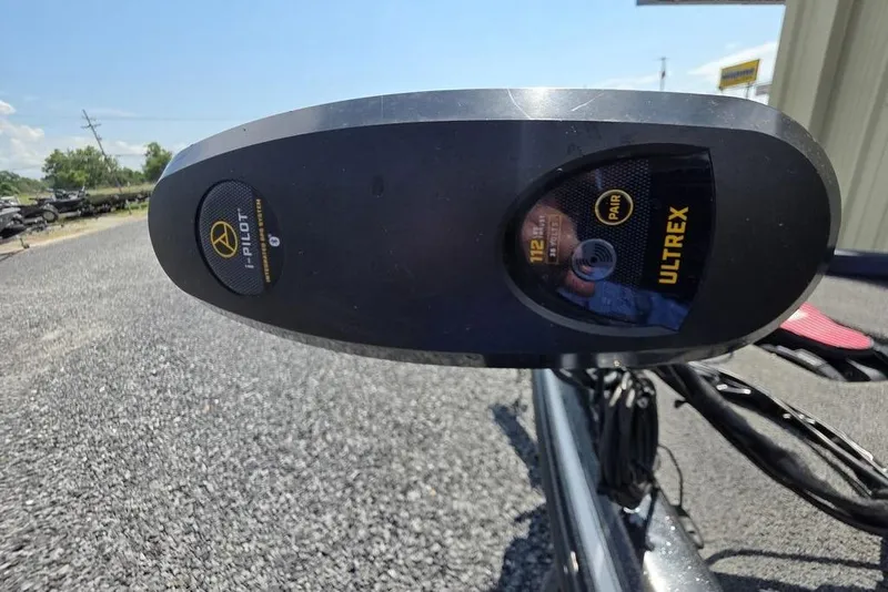 Slide: The Image of Close-up of a 2012 Phoenix 721 ProXP boat's Ultrex trolling motor on gravel. - 25