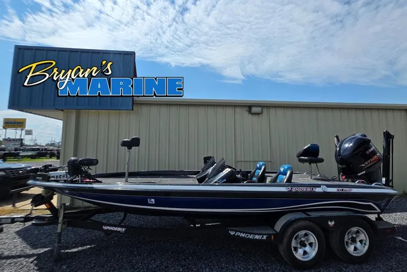 Slide: The Image of 2012 Phoenix 721 ProXP boat at Bryan's Marine dealership. - 9