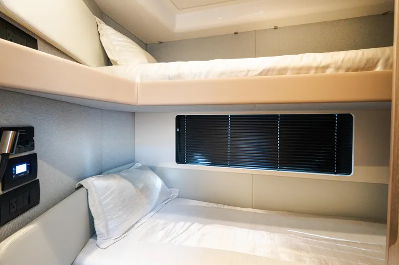 Slide: The Image of 2023 Azimut Fly 50 yacht interior with modern bunk beds and sleek design. - 104