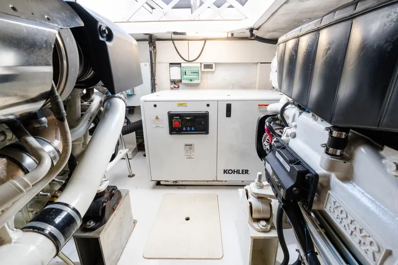 Slide: The Image of Engine room of 2023 Azimut Fly 50 yacht featuring Kohler generator and mechanical components. - 114