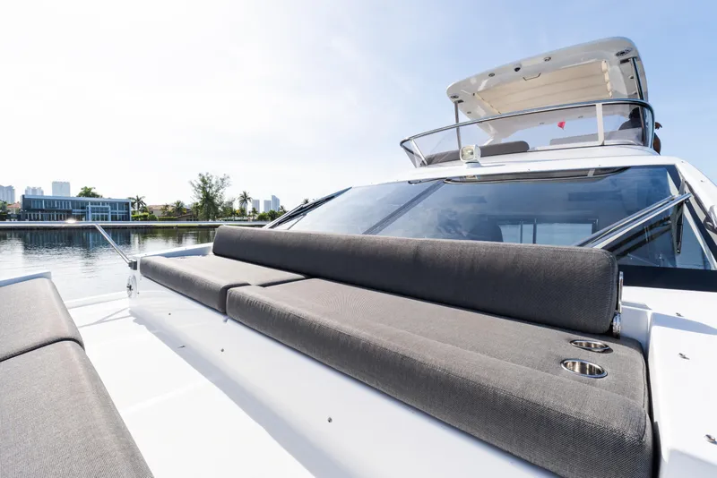 Slide: The Image of 2023 Azimut Fly 50 yacht with sleek design and comfortable seating on deck. - 28