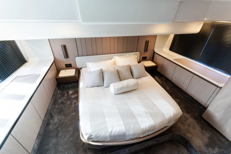 Slide: The Image of Luxurious bedroom interior of 2023 Azimut Fly 50 yacht with modern design and elegant furnishings. - 84