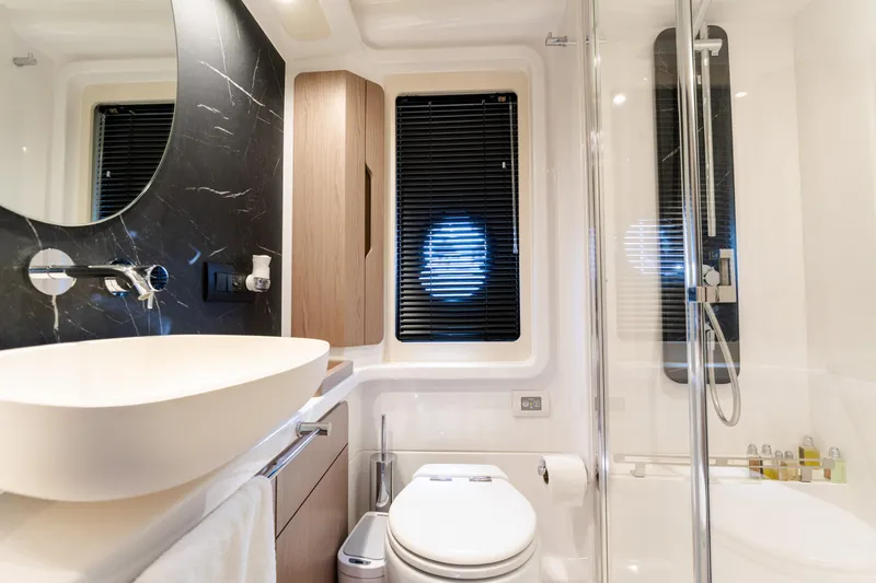 Slide: The Image of Luxurious bathroom in 2023 Azimut Fly 50 yacht with modern fixtures and elegant design. - 92