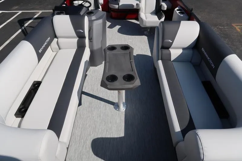 Slide: The Image of 2026 Bennington S Swingback 22 SSB SPS pontoon boat interior with seating and table. - 13