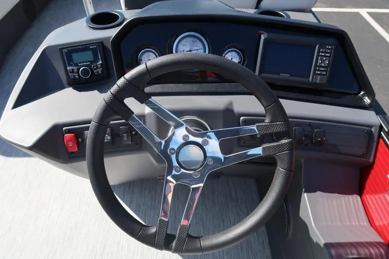 Slide: The Image of Steering console of 2026 Bennington S Swingback 22 SSB SPS with modern controls and gauges. - 17