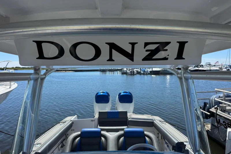 Slide: The Image of 2008 Donzi 32 ZF Open boat interior with water view in the background. - 12