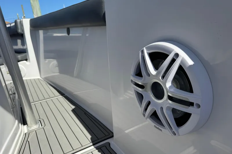 Slide: The Image of 2008 Donzi 32 ZF Open boat interior with speaker and sleek flooring. - 14